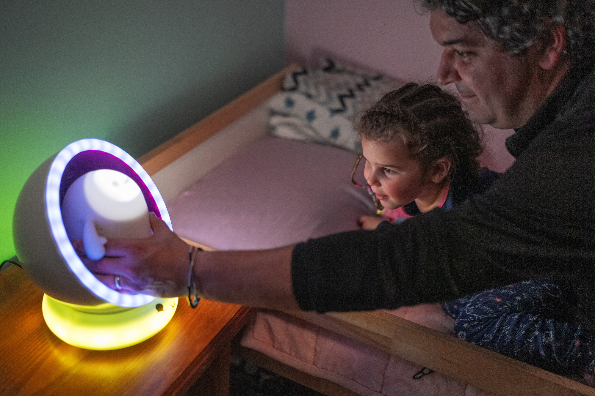 Family using Snorble at bedtime