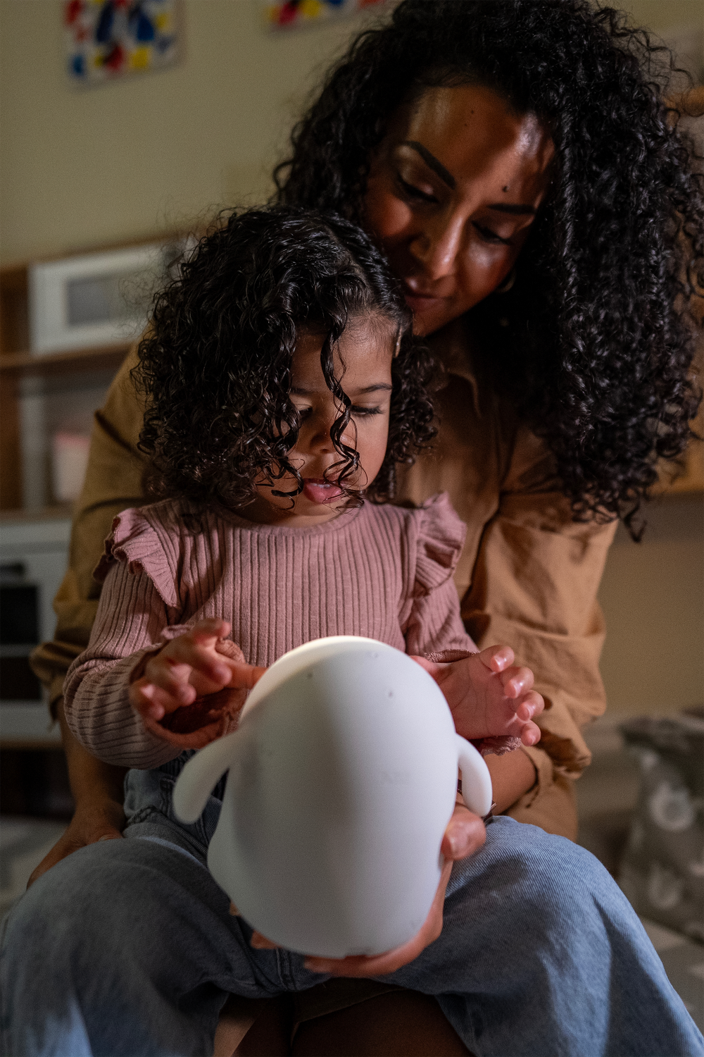 Mother and child enjoying Snorble together, sharing a moment of connection